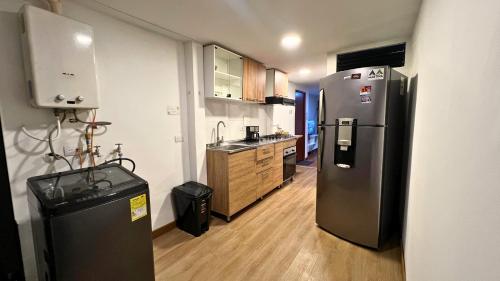 Kitchen, Duplex familiar cerca al Cable y Milan con patio in Ecoturistico Cerro de Orro