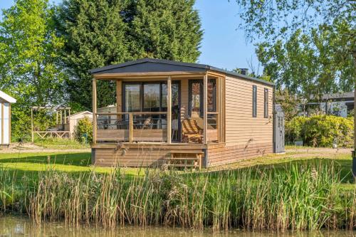 Camping Papillon Kinrooi - Vakantiehuis Premium 4P gîte à louer Gremelslo