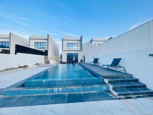 3BR villa and maid room by escape time in Al Aqah