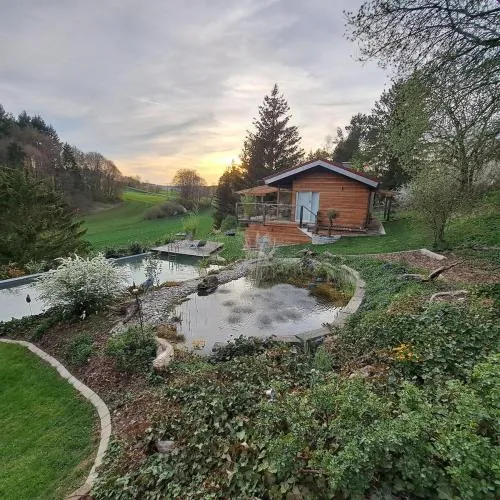 Alb Chalet mit Naturschwimmteich in Heroldstatt, Deutschland
