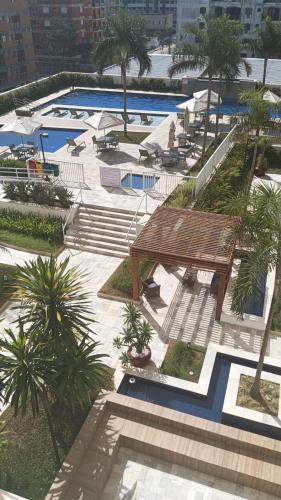 Apartamento Guaruja Enseada Mobiliado Varanda gourmet e lazer completo – khách sạn tại Tortuga