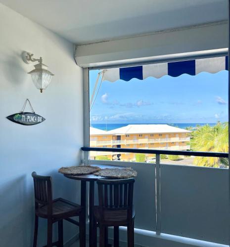 Studio vue mer avec un accès plage à 1 min (Studio vue mer avec un acces plage a 1 min) in Le Moule
