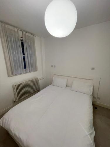 Pont Street Apartment by CMG in Kensington and Chelsea