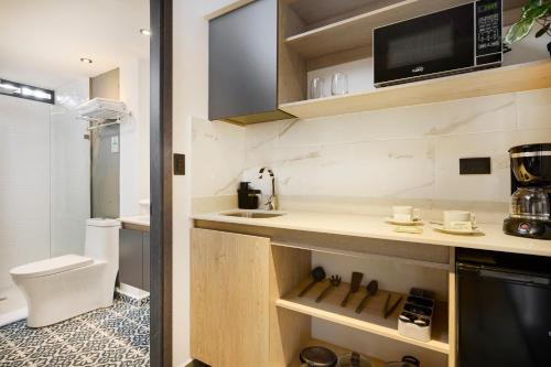 Baie, Hotel Attic 33 in Medellín