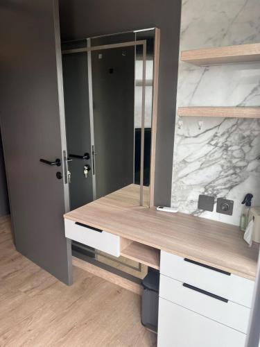 Cozy Apt 1BR 70m2 Free Netflix Wifi Grand Dharmahusada Lagoon near Technology Institute of Sepuluh November - ITS