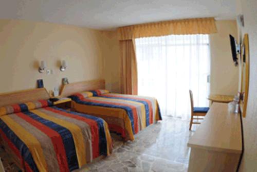 Hotel Maria Eugenia Ideally located in the prime touristic area of Tuxtla Gutierrez, Hotel María Eugenia promises a relaxing and wonderful visit. The property features a wide range of facilities to make your stay a plea