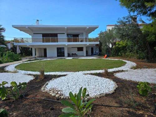 The House By The Sea - family memories strats here