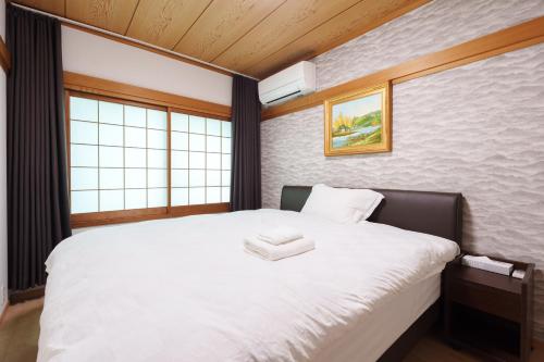 Dotonbori Guesthouse 自安居