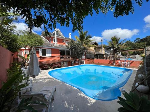 Casa 250m2 Condominio em Frente a Praia in Mole Beach