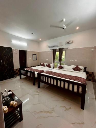 LUXUS Resort & Swimming Pool in Auroville Road