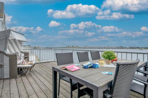 Vista exterior, Maisonette Fewo Kapteins Lounge by Seeblick Ferien ORO, Rundum Wasser, 6Pers, Sauna, Kamin in Olpenitz