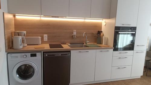 Appartement T2 neuf plein centre village in Abrī