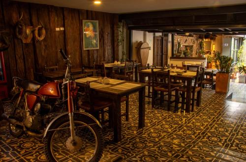 Restaurant, Hotel Quinta Bolivar in Bogotá