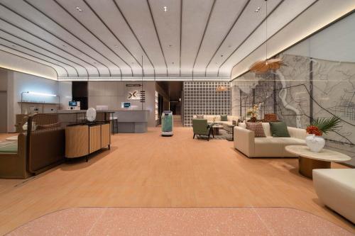 ردهة, Xinn Hotel (Haikou West Coast Convention and Exhibition Center Branch) - Dahua Group in Xiuying