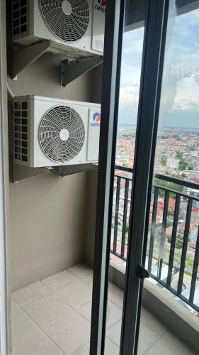 Cozy Apt 1BR 70m2 Free Netflix Wifi Grand Dharmahusada Lagoon near Technology Institute of Sepuluh November - ITS