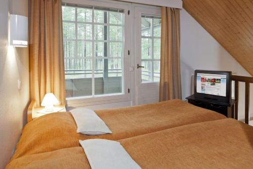 cottage studio with sauna and Mezzanine in คาลาโยกิ