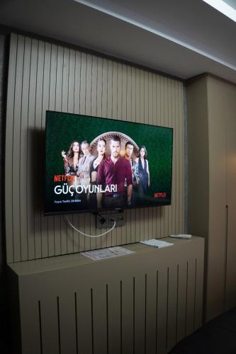 Koplietošanas atpūtas telpa ar TV, stay on hotel in İzmir