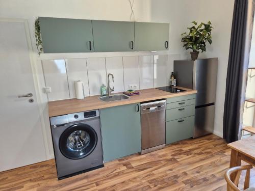 廚房, 2-Zimmer Wohnung 4 - Apartments am Schloss in 上施萊斯海姆