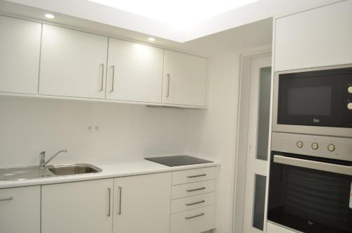 ห้องครัว, Lila's Beach Apartment in ลิฟราเมนโต