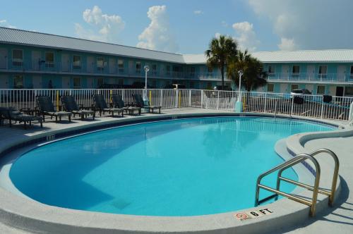 Swimming pool, Destin Inn & Suites near Shrimp Basket