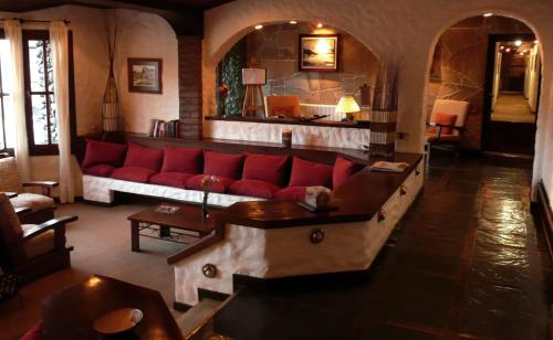 Shared lounge/TV area, Hotel Michelangelo in El Calafate