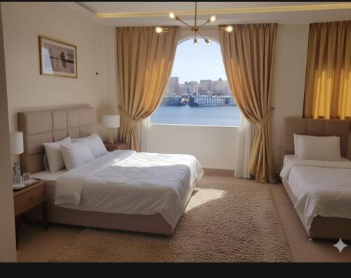 Habitación triple, vistas al mar