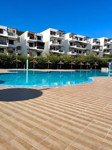 수영장, Appartement 2 chambres, près de la mer, résidence calme (Appartement 2 chambres, pres de la mer, residence calme) in 카보 네그로