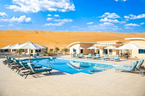 Swimming pool, Arabian Nights Resort & Spa in A'Sharqiyah Sands (Wahiba)
