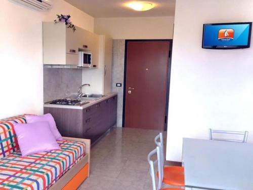 Relax and unwind by the pool in Bibione
