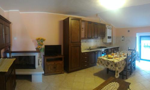 Koplietošanas atpūtas telpa ar TV, B&B Il Fratino in Pescocostanzo