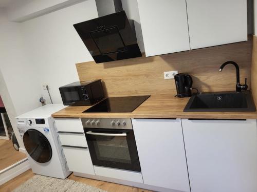 Cozinha, FlexHome Stadtnahe Ferienwohnung in Centro da cidade