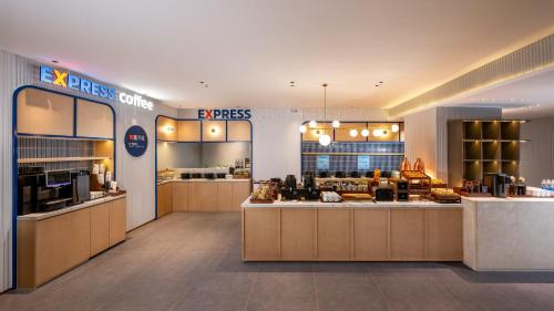 홀리데이 인 익스프레스 선전 스포츠 센터 바이 IHG - 레스토랑