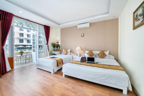 Family Suite with Balcony room in Palm Beach Hotel