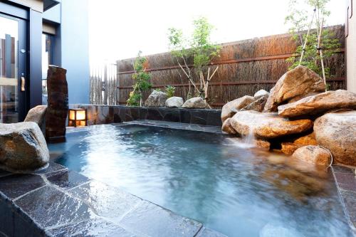 Open air bath, Dormy Inn Nagano Zenkounoyu Natural Hot Spring near Shimanryo Street