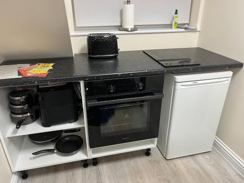Quiet studio flat near University & QMC, King size bed in 沃萊頓