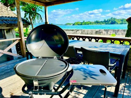 오키나와 본섬 okinawa海宿は海まで徒歩15歩の1棟貸でBBQ可能 (okinawa海宿は海まで徒歩15歩の1棟貸でBBQ可能) 4성급 싱글룸 레스토랑