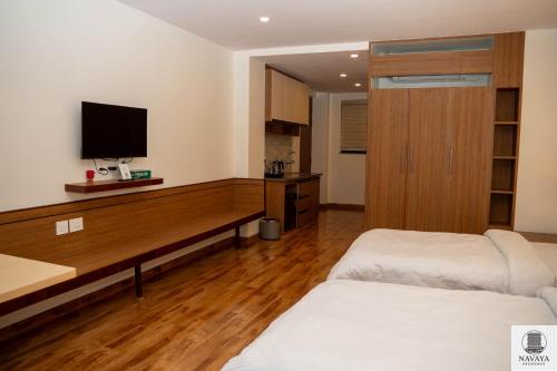 One-Bedroom Apartment with Balcony and City View
