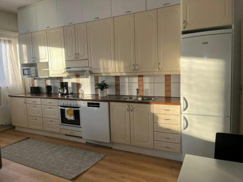köök, Spacious Apartment for 4 with Sauna in Utajärvi