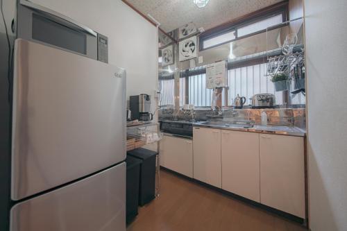 Private house near Umeda, limited to one group per day entire house 6 min walk to Nakazakicho station