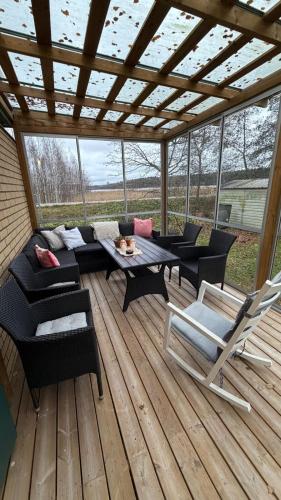 Private House and Winter Garden in Marjaniemi