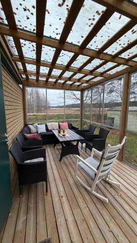 Private House and Winter Garden in Marjaniemi