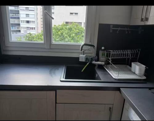 Appartement cosy a 2 mins de Paris