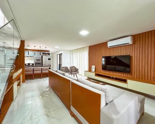 Koplietošanas atpūtas telpa ar TV, Casa Moderna & Conforto in Eusebio