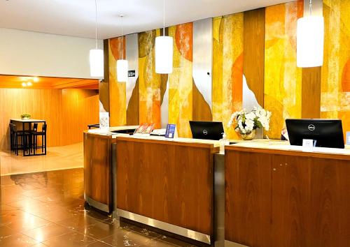 Le Village Flats e Hotel in Joinville
