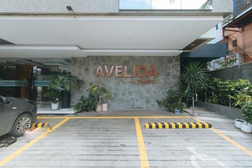 Avelida Homes by RedDoorz - 출입구