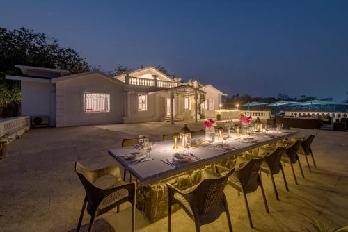 Exterior view of SaffronStays Brunton House - 3BR Villa with Pool & Alfresco dining