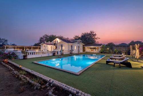 Exterior view of SaffronStays Brunton House - 3BR Villa with Pool & Alfresco dining