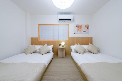 1f 商店街横の庭園を楽しむお風呂付きの宿 4寝室 ベッド12点 バスルーム3点