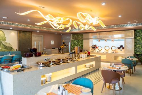 Restaurant, Hotel Coral reef Kakkanad in Kakkanad