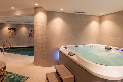 Chalet Yolo with Pool and Spa in La Gittaz